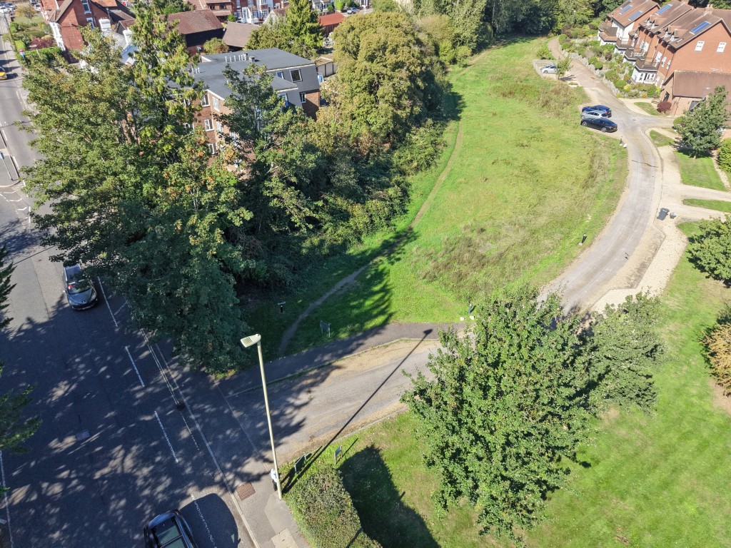 Lot: 53 - FREEHOLD LAND WITH POTENTIAL - Aerial view of land with Station Road